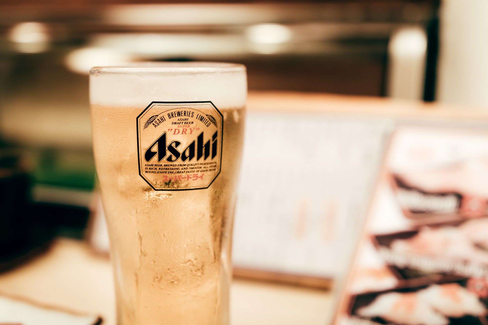 A recent Asahi Beer settlement recently mailed checks to consumers.