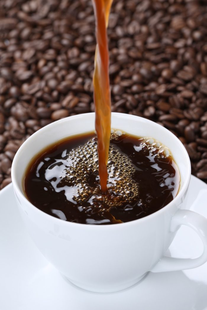 folgers coffee pouring into coffee cup