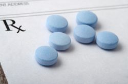 pills on prescription form for opioid settlement purdue