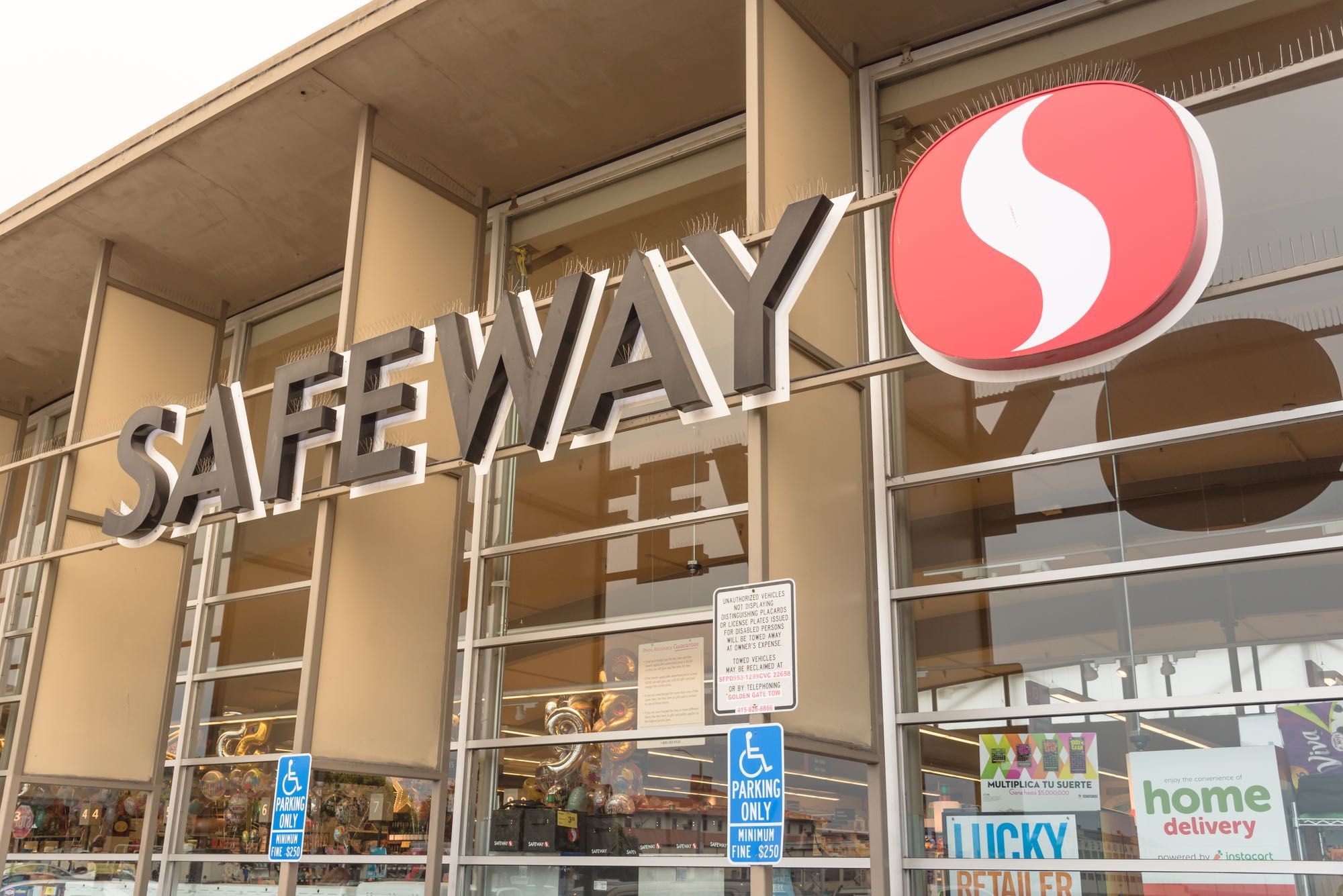 Safeway sign on storefront