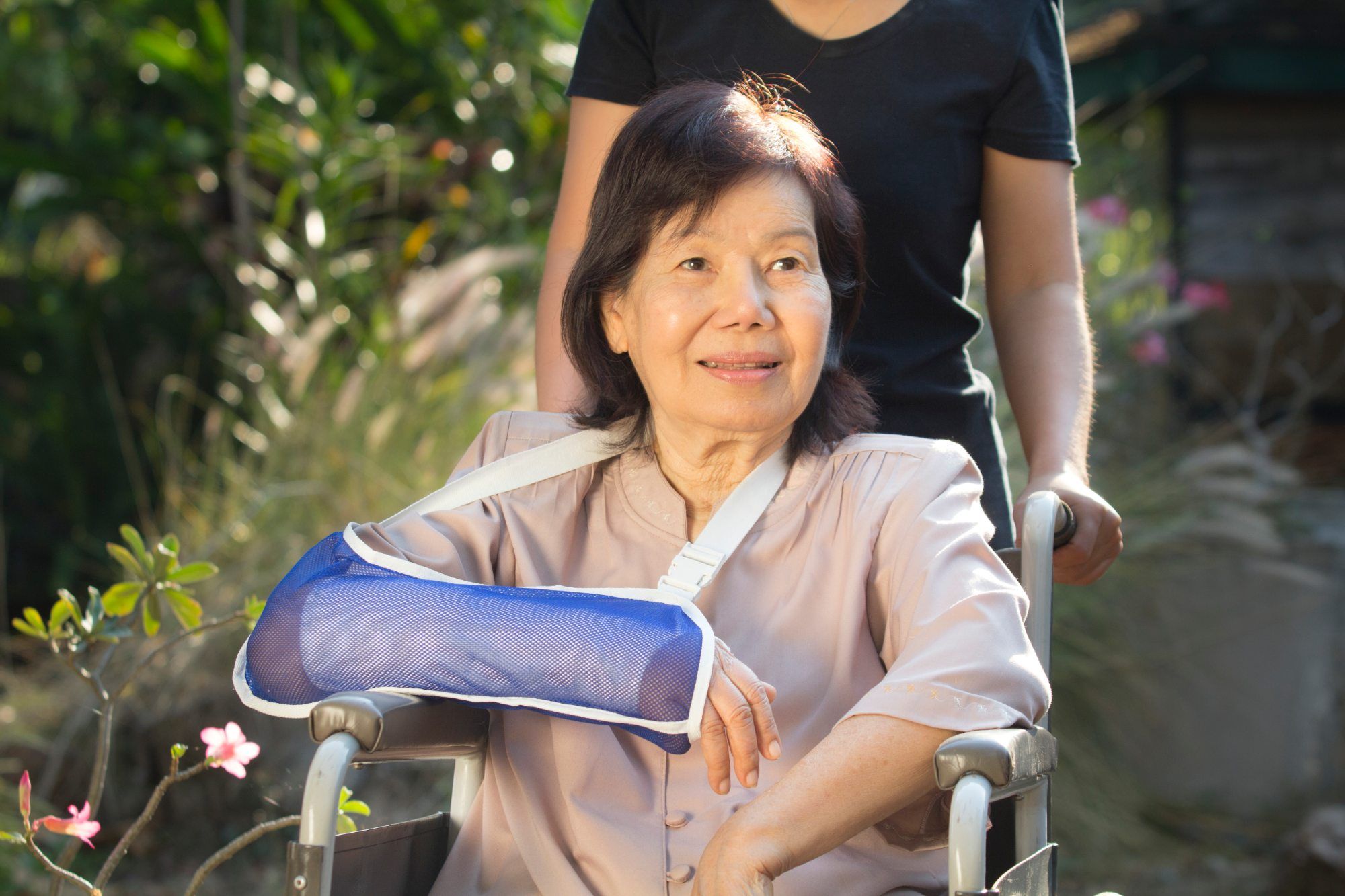 A woman has her arm in a cast.