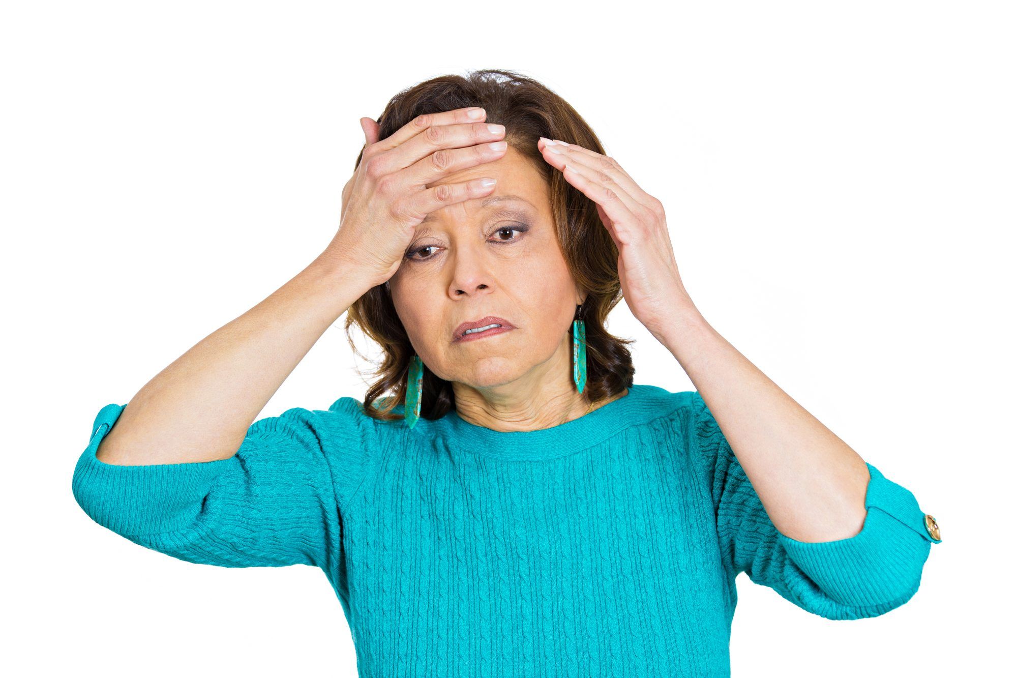 older woman holding head with headache