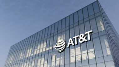 ATT Corporation Signage Logo on Top of Glass Building.