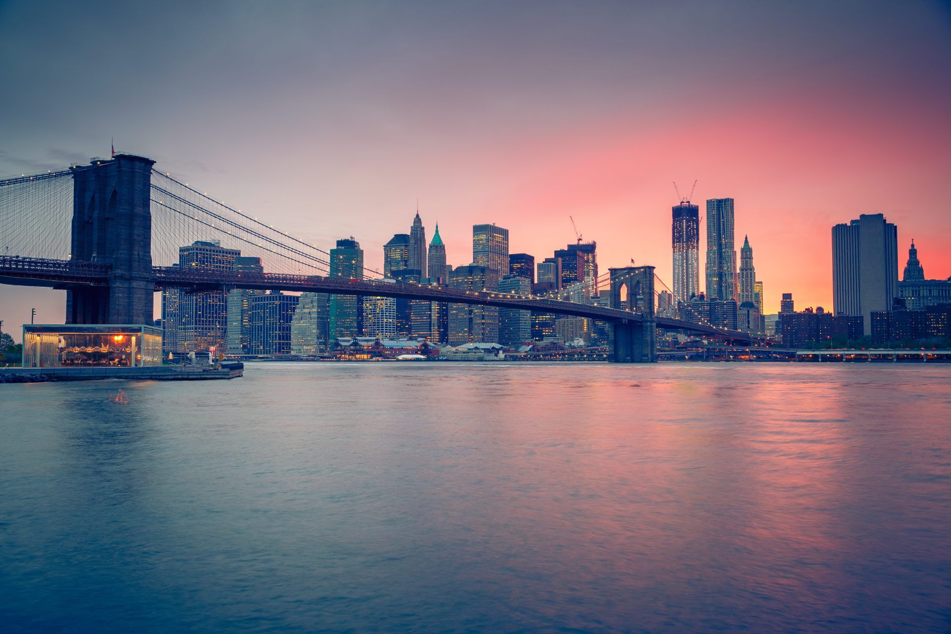 Brooklyn Bridge and Manhattan skyline at dusk