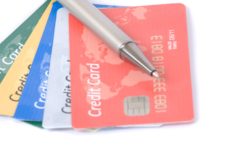 closeup of credit cards and a pen