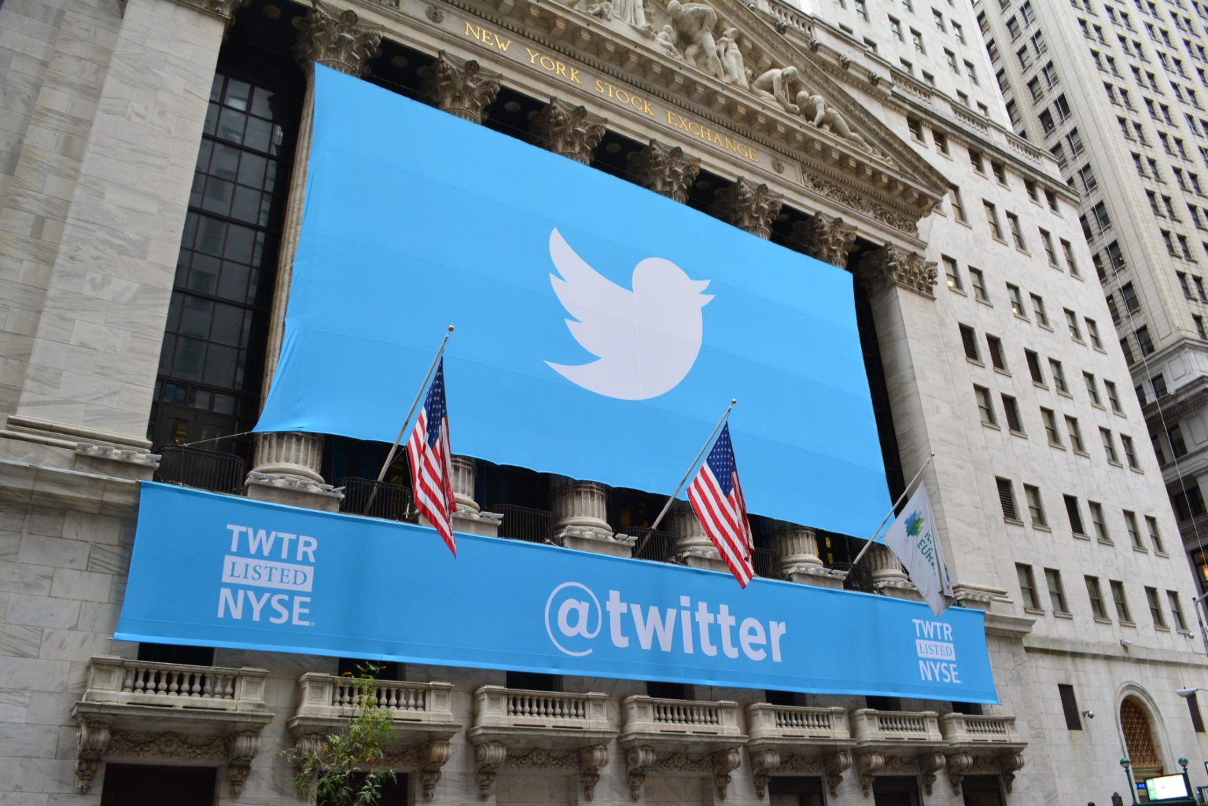 Twitter banners hang on outside of the New York Stock Exchange building