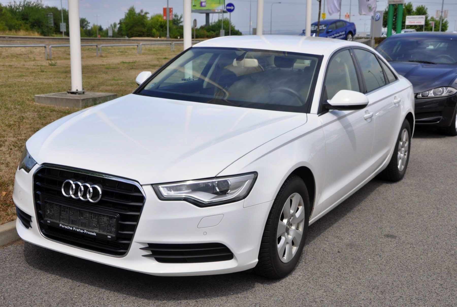 White Audi A6 - Audi class action claims atuomatic start/stop engine feature defective