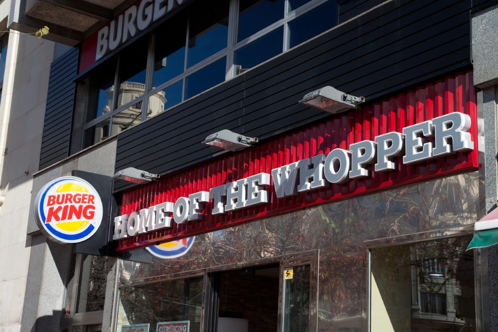 Burger King storefront reads "Home of the Whopper" - Burger King Impossible Whopper