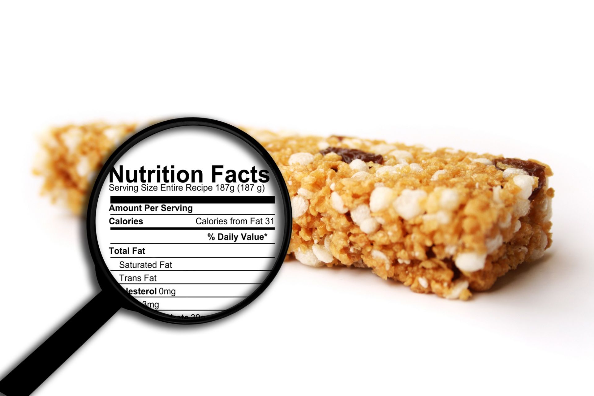 Granola bar with magnifying glass showing image of nutrition facts label