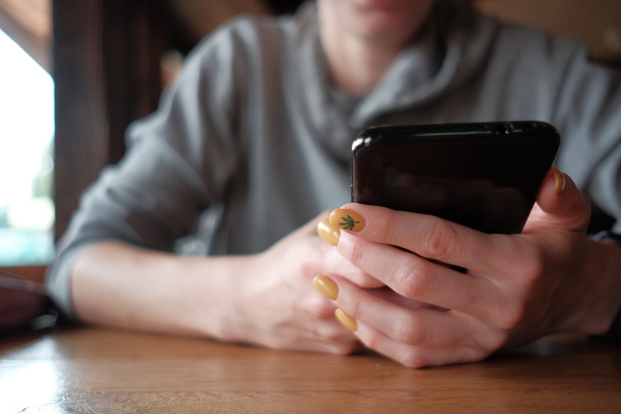 woman looking at unwanted call