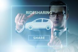 Businessman and rideshare concept on screen