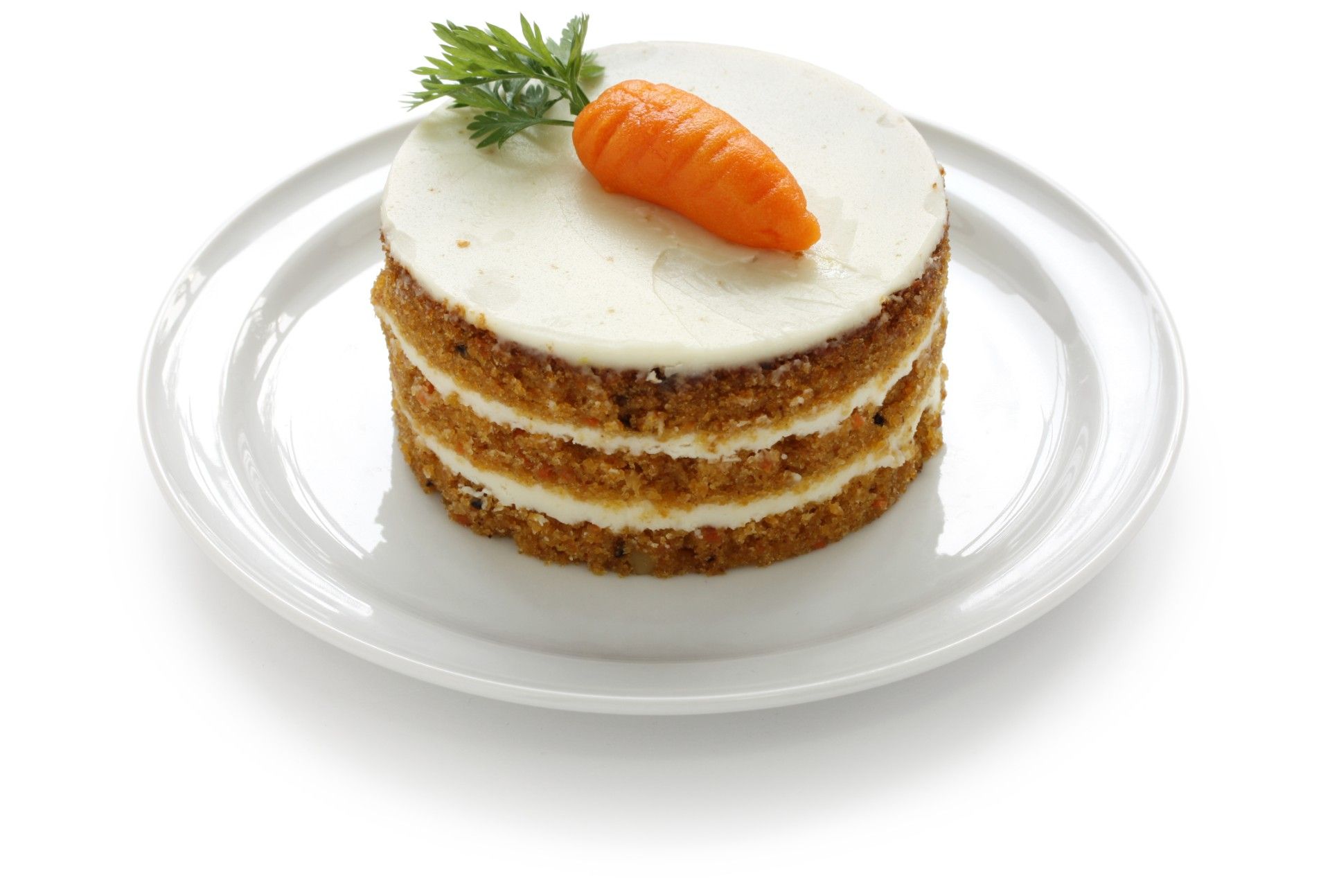 Round piece of carrot cake on a white plate - Hostess Donettes