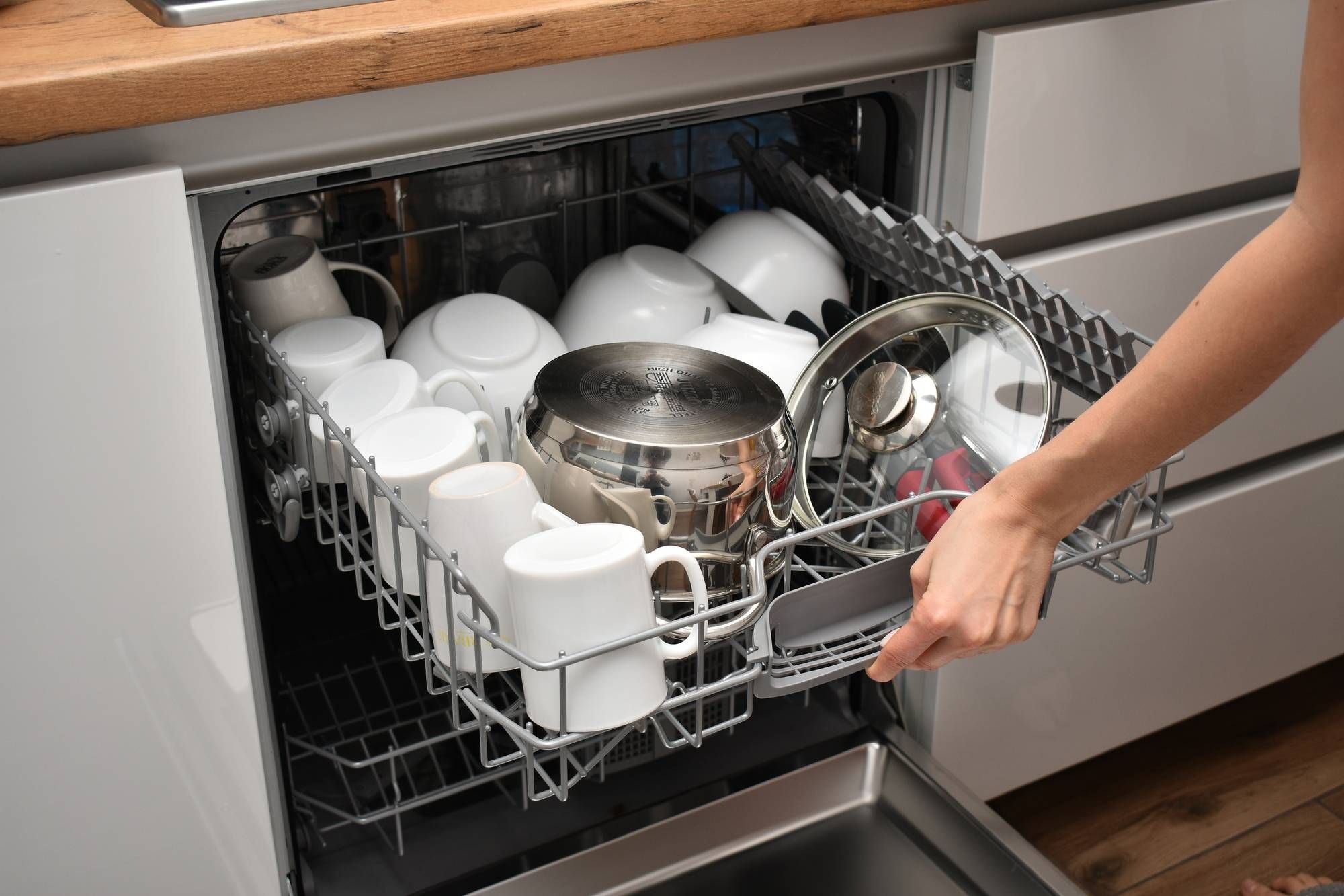 How to put a dishwasher rack back on track 