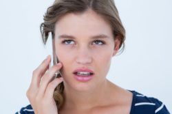 unhappy woman on phone call