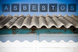 Asbestos sign over roof