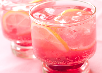 Pink lemonade in two glasses - True Lemon