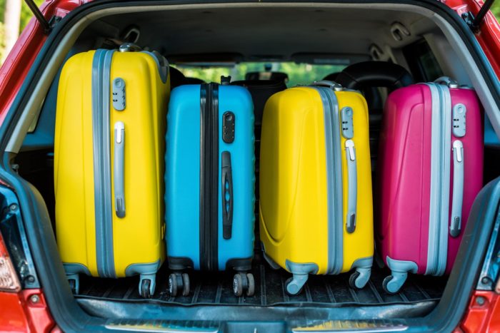 suitcases or baggages in back of car ready to travel
