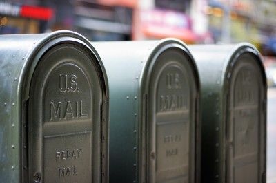 A row of small U.S. mailboxes - ballot delivery