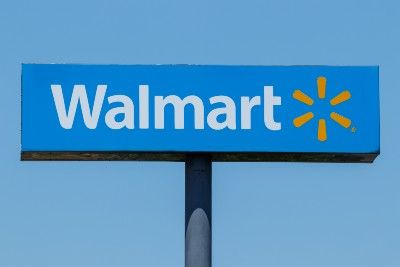 Blue Walmart sign on tall post - Walmart equate