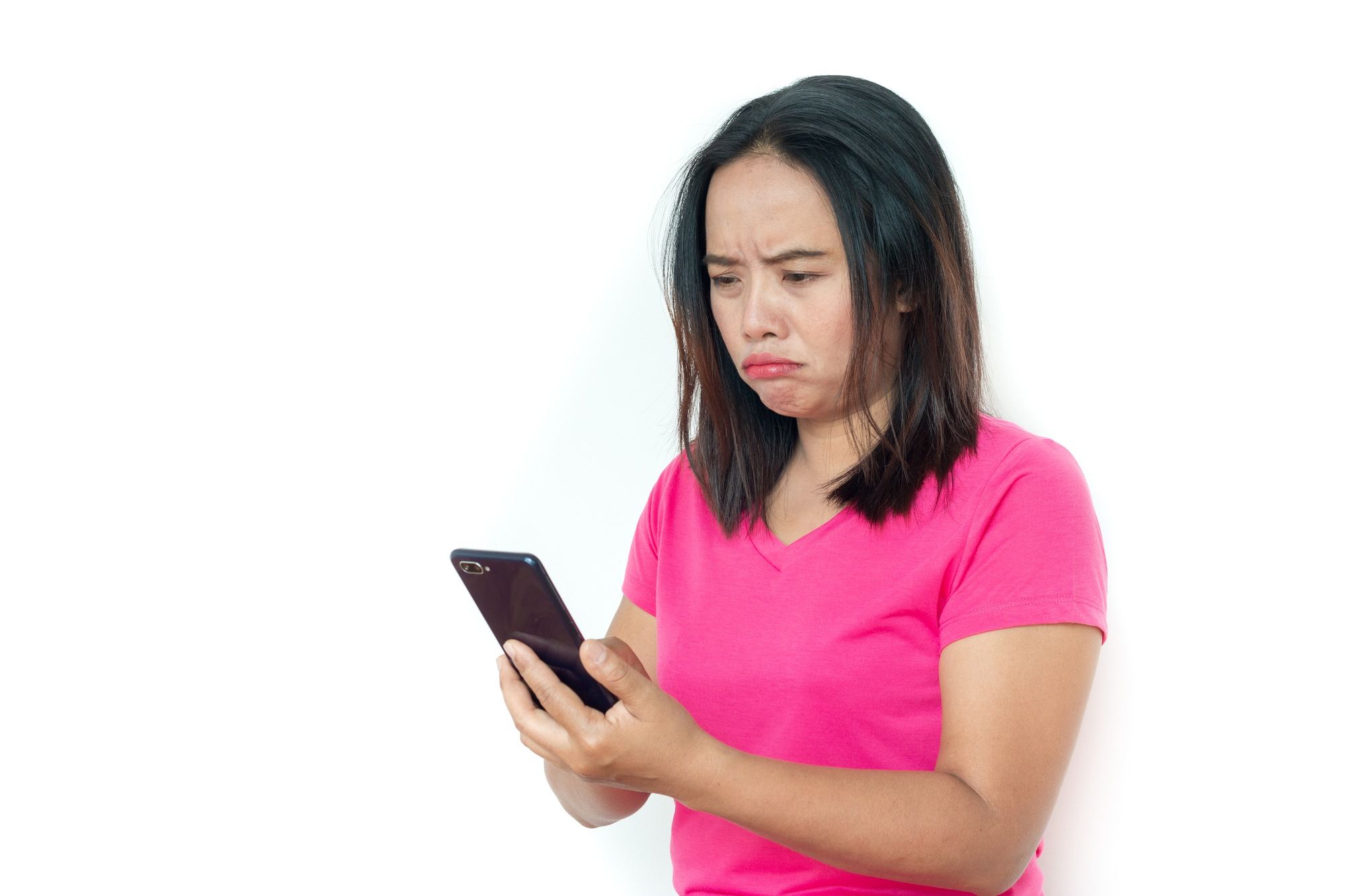 Unhappy woman reads text