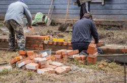 Bricklayers work with material that could contain asbestos, including cement