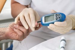 Type-2 diabetic getting glucose levels checked