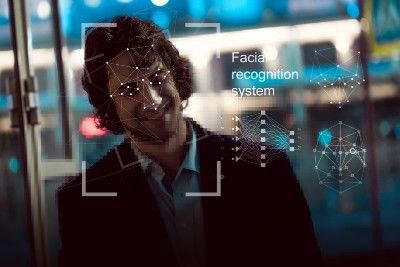 A man's face is mapped using facial recognition security cameras