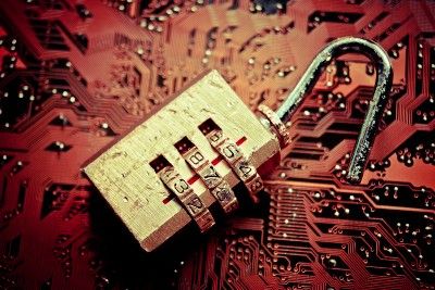 An open combination lock on a circuit board - 