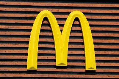 McDonald's arches logo on a wall - racial discrimination
