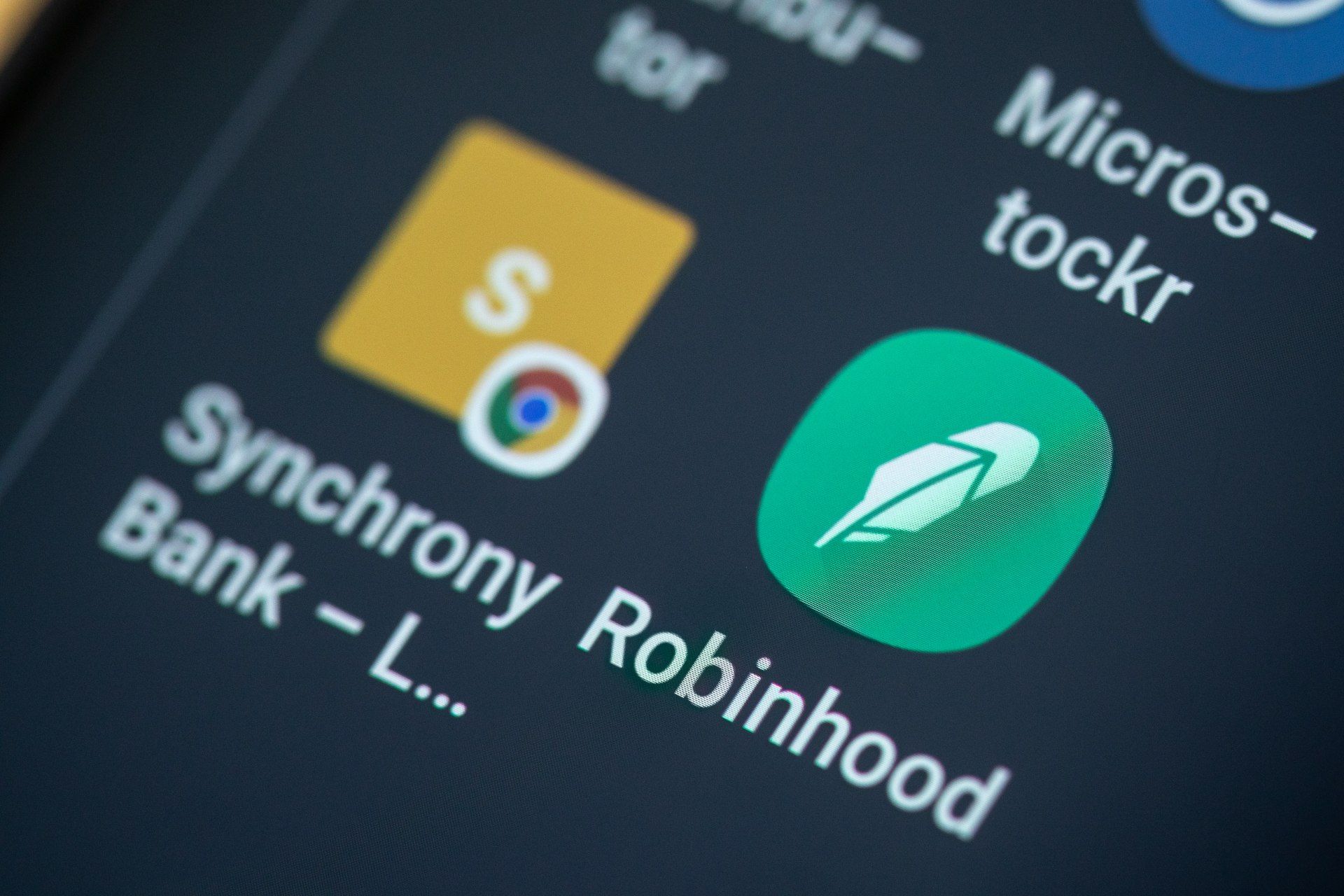 The Robinhood app is seen on a smartphone screen - robinhood app outage