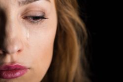 Closeup of woman crying