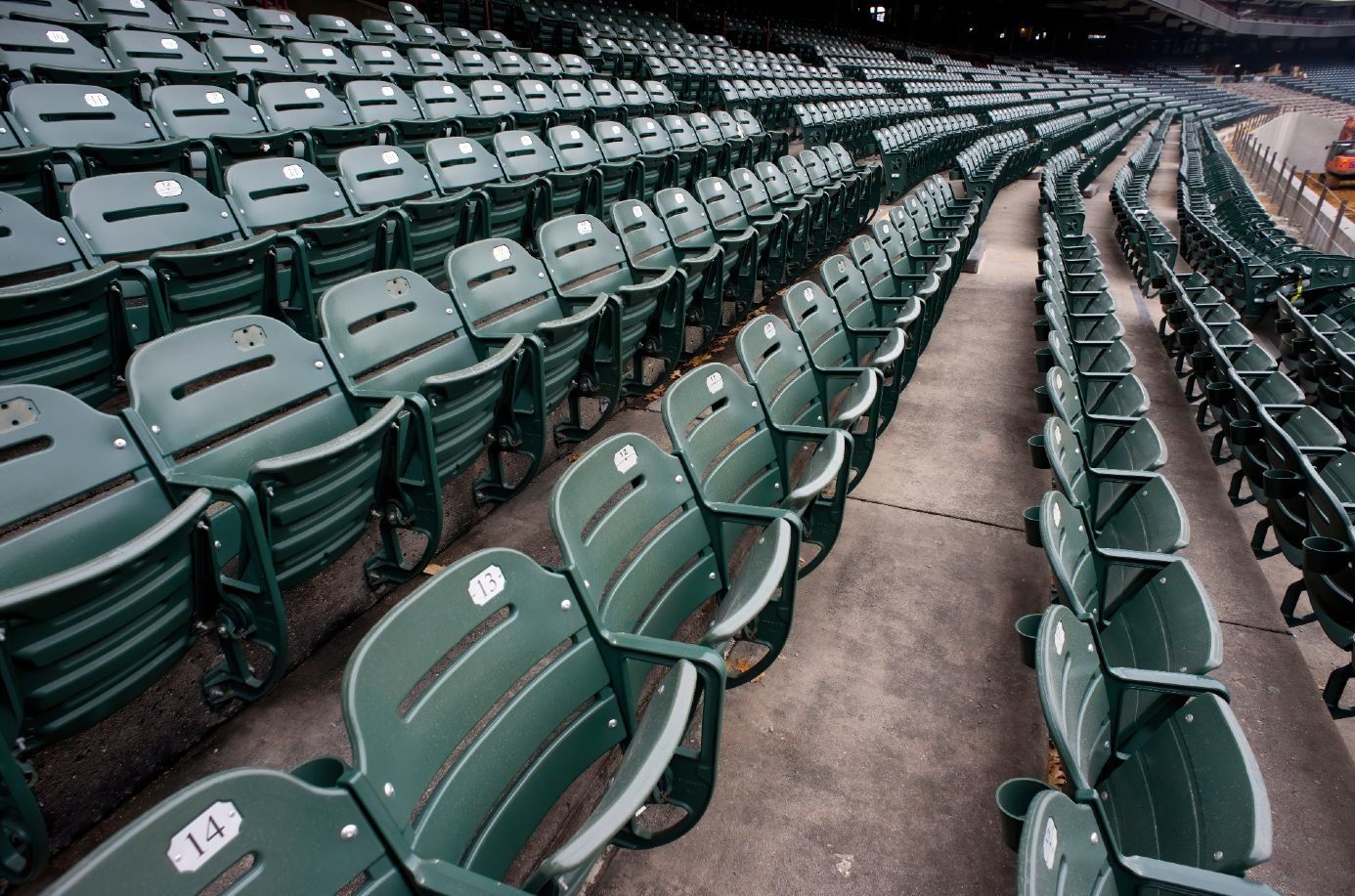 Green stadium seats sit empty during the pandemic - minor league baseball