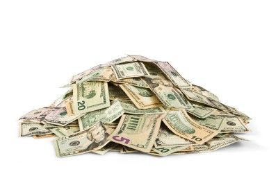 A pile of cash on a white background