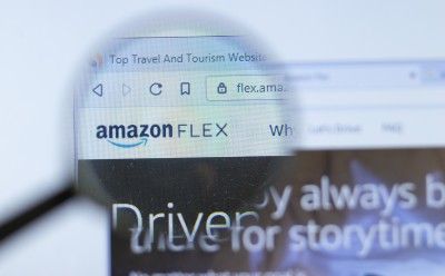 Amazon Flex website logo under magnifying glass - Amazon flex drivers