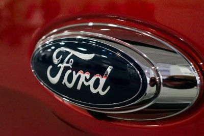Ford emblem on red vehicle - Ford safety recall