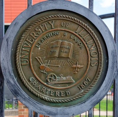 The University of Illinois seal on a fence at the school's Urbana-Champaign campus - tuition refund
