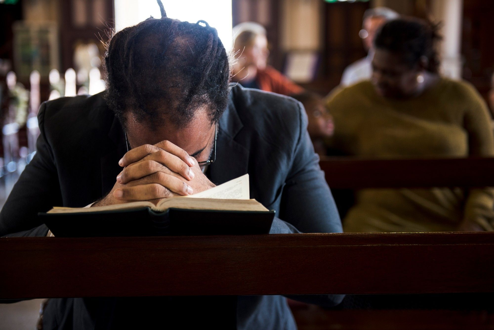 Survivor of Catholic sex abuse prays in church