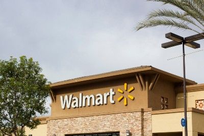 Walmart sign on store front - military leave