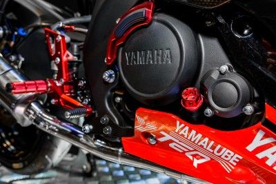 Engine on a red Yamaha motorcycle - brake switch