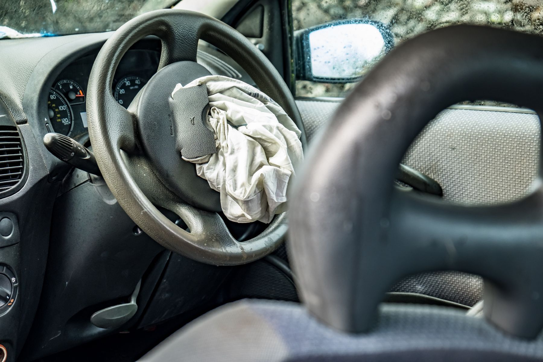 Airbag deployed on a steering wheel - takata airbag