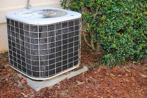 An air-conditioning unit outside a home - landmark home warranty