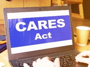 "CARES Act" is seen on a laptop screen - Oregon cares