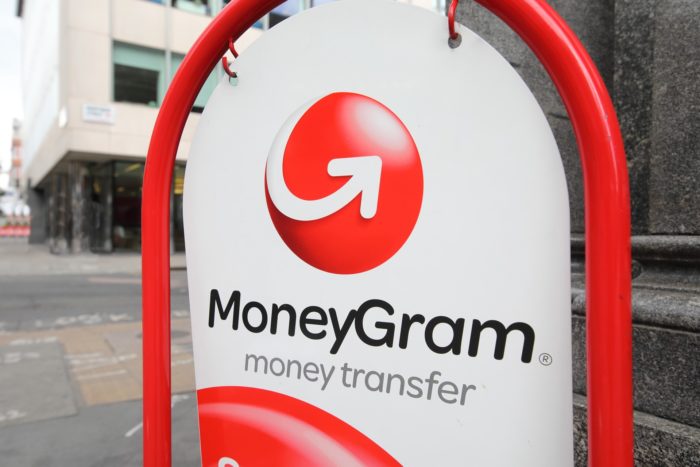 MoneyGram sign outside a building - money transfer