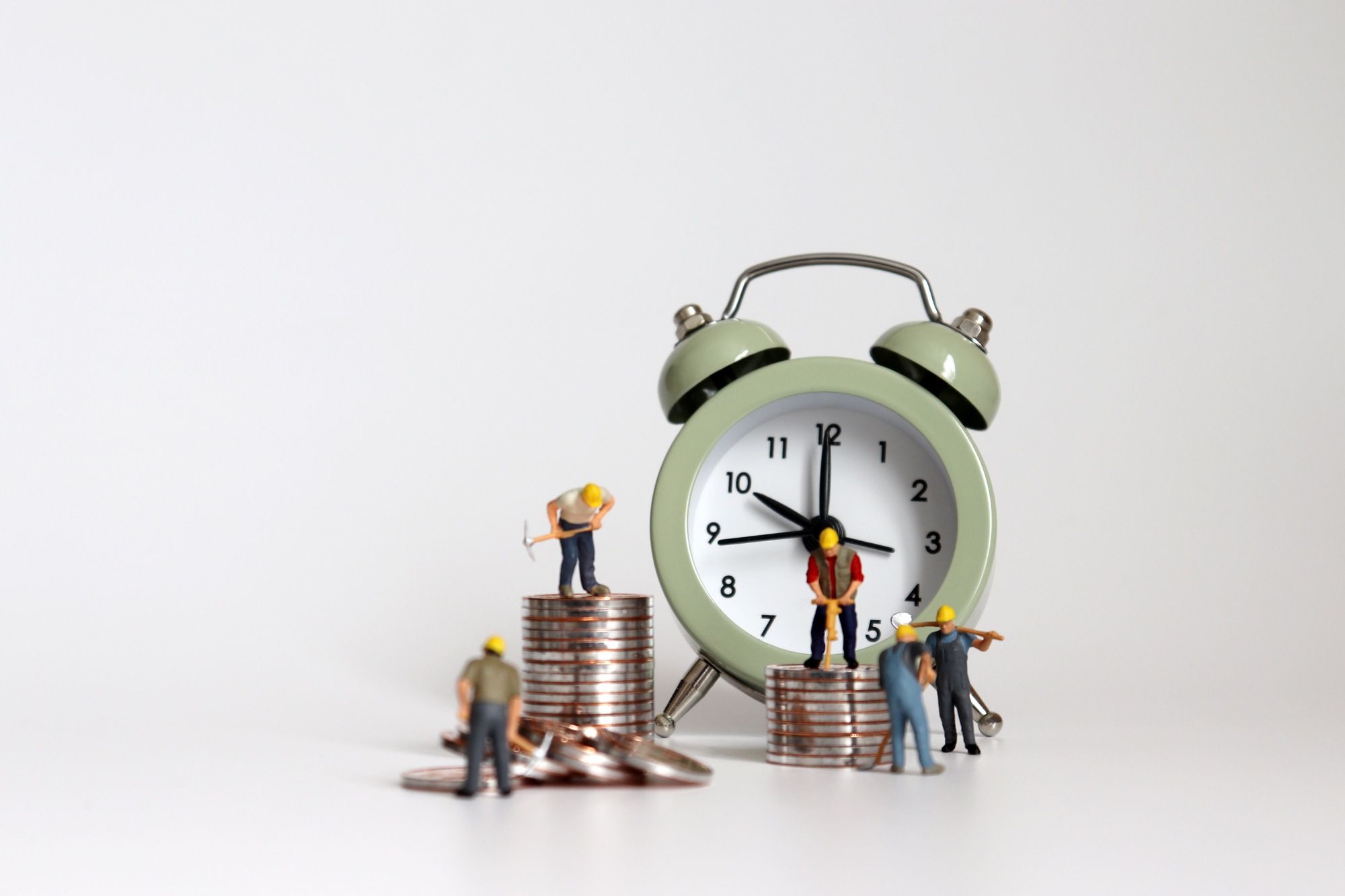 alarm clock and money representation of labor