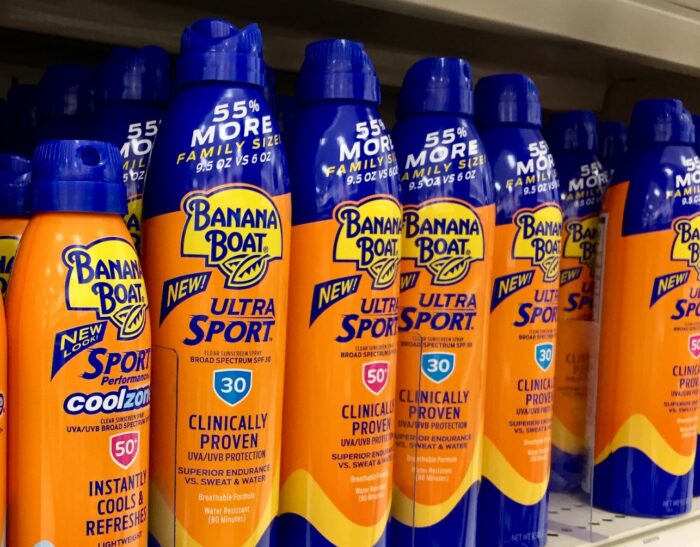 Banana Boat sunscreen is seen on a store shelf, representing the benzene class action lawsuit.