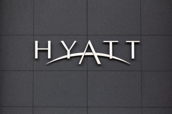 Hyatt logo on building - Hyatt hyatt settlement - hyatt class action