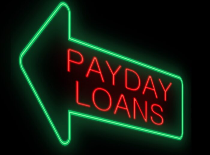 Illustration depicting a neon sign with a payday loans.