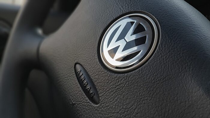 A Volkswagen steering wheel with the word "airbag" on it - volkswagen and audi - airbag settlement - volkswagen airbags - audi airbags - airbag class action