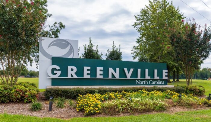 Greenville, North Carolina, town sign - Greenville Utilities Commission - water and sewer fees