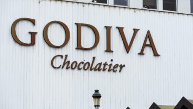 Facade and sign of the Godiva Chocolatier chocolate factory - godiva chocolates